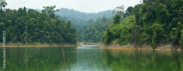Fototapeta Islands in Banding Lake, part of Royal Belum rainforest