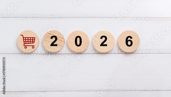Obraz Red Shopping Cart Icon with Wooden Round Discs Displaying the Year 2026