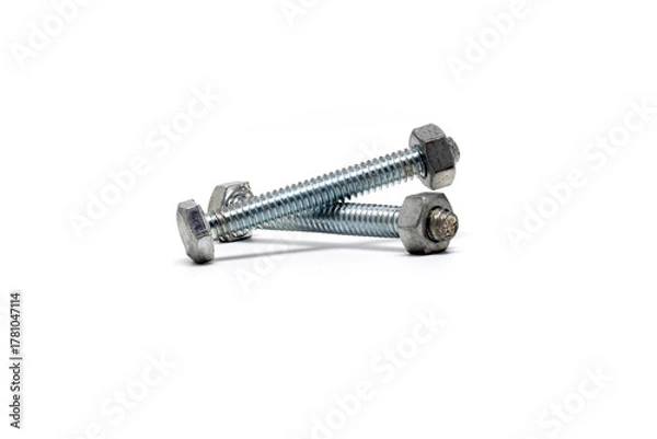 Fototapeta Galvanized Steel Bolts and Nuts Closeup on White Background