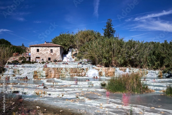 Fototapeta People bathing in the hot water at Terme di Saturnia in Tuscany