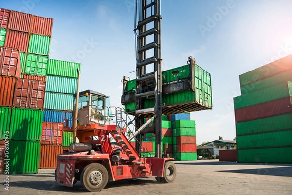 Fototapeta A forklift that works in a container.Transportation and logistics