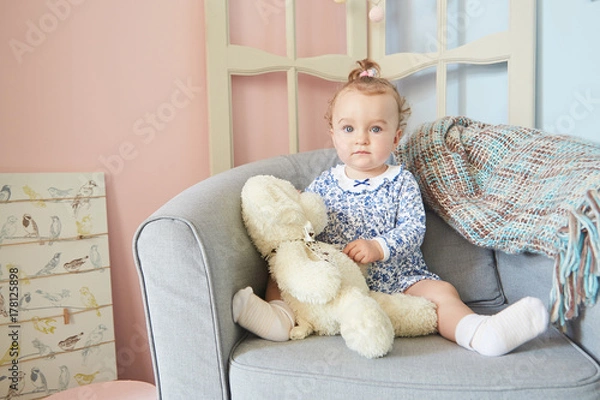 Obraz a little girls playing  in the house for dolls with bear. polar bear