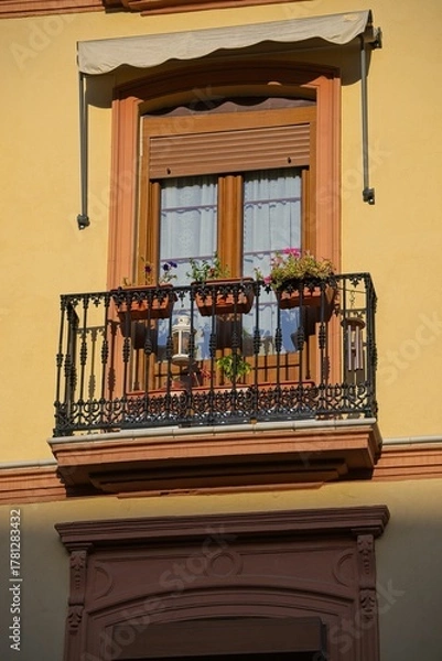 Obraz beautiful house with balcony in Seville