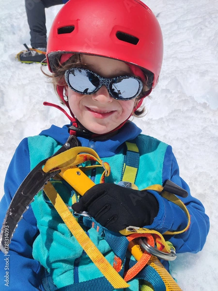 Obraz Selfie of a child with mountaineering equipment.