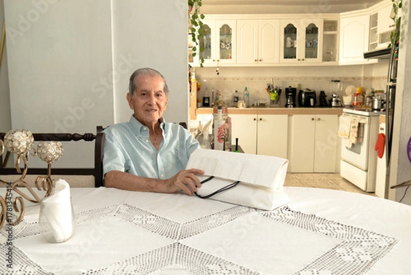 Obraz Latino senior citizen with a white shopping bag