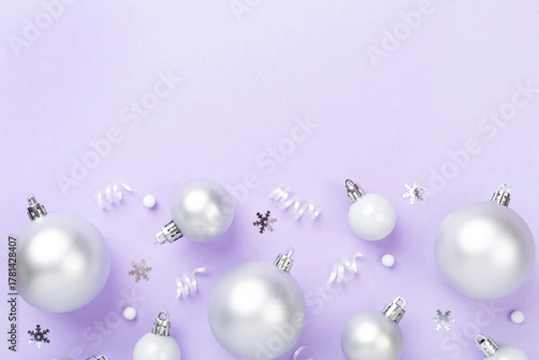 Obraz Grey Christmas balls with decor on color background, top view