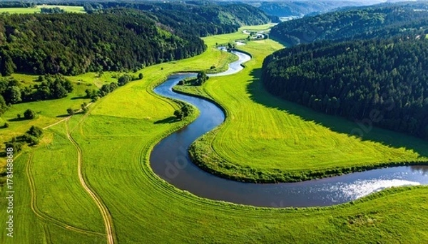 Obraz Vibrant Green Valley With A Winding River Under A Clear Blue Sky On A Sunny Day Detailed Scenic Landscape View