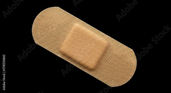 Obraz Adhesive bandage on black background for wound care