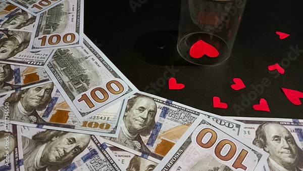 Fototapeta A symbolic image showing, dollar bills, and red heart shapes, representing the balance between love, money, and justice in relationships, divorce, or emotional decisions.