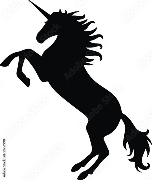 Fototapeta Majestic black silhouette of a rearing unicorn with a flowing mane and tail