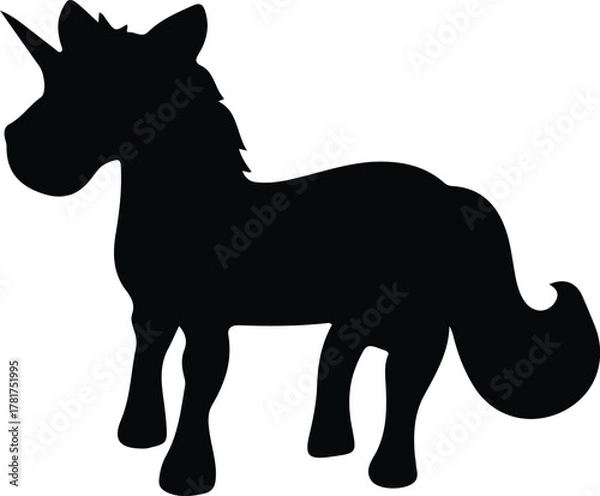 Fototapeta Silhouette of a majestic unicorn standing with its horn pointed forward