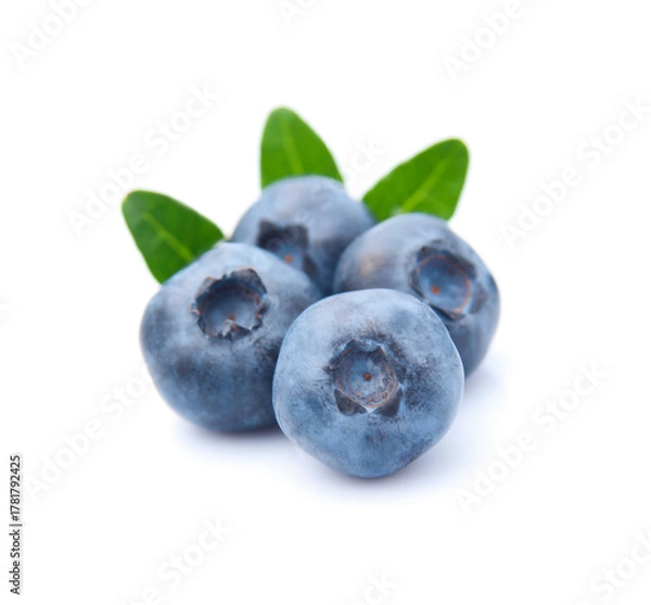 Obraz Blueberries with leaves on white backgrounds