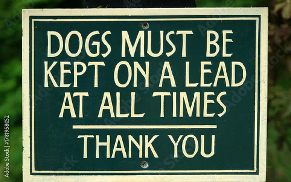 Fototapeta Warning Sign: Dogs Must Be Kept on a Lead at All Times