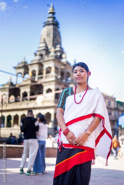 Obraz Nepali Newari Girl in Traditional Attire Gracefully Posing for Photoshoot at Patan Durbar Square