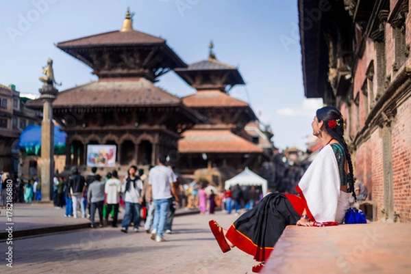 Obraz Nepali Newari Girl in Traditional Attire Gracefully Posing for Photoshoot at Patan Durbar Square