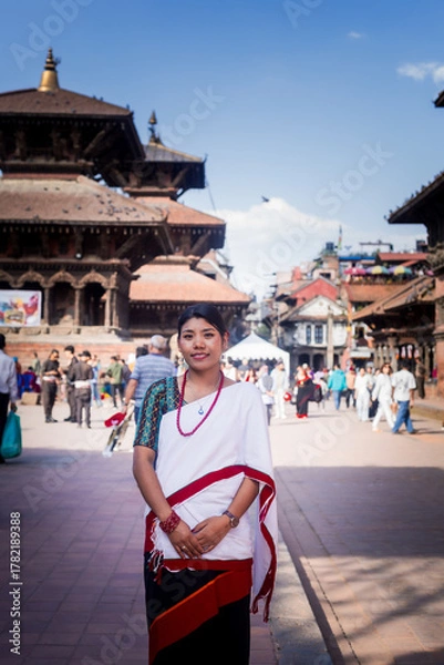 Obraz Nepali Newari Girl in Traditional Attire Gracefully Posing for Photoshoot at Patan Durbar Square