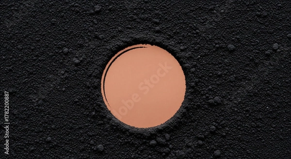 Obraz Copper Circle Embedded in Textured Black Surface
