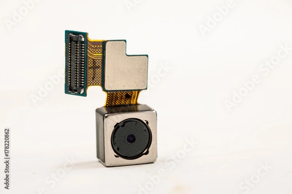 Fototapeta Smartphone camera module on a white background, closeup