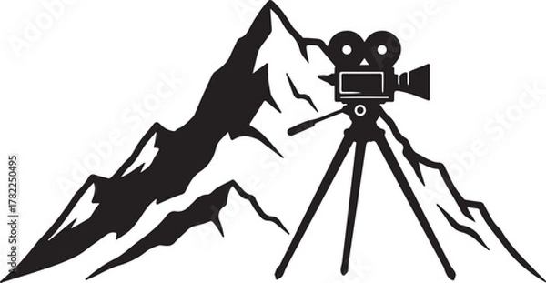 Fototapeta Retro Movie Camera Against Majestic Mountain Silhouette for Filmmaking Adventure