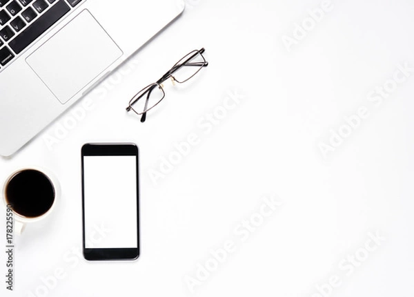 Fototapeta Top view, Modern workplace with laptop and coffee with smart phone placed on a pastel yellow background. Copy space suitable for use in graphics.