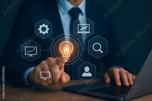 Fototapeta Business Innovation and Technology Concept with Professional Touching Virtual Lightbulb Interface
