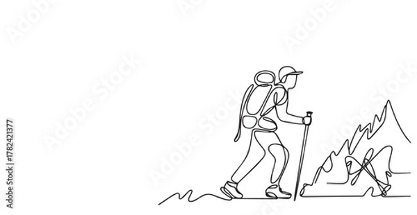Fototapeta Silhouette of a hiker with a backpack climbing a rocky peak against a white background view outdoors