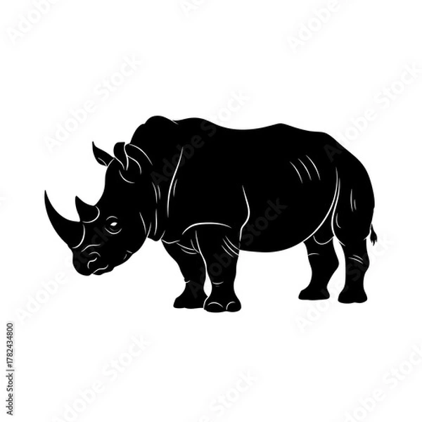 Fototapeta Silhouette of a Powerful Rhinoceros - Wildlife Icon in Black and White.