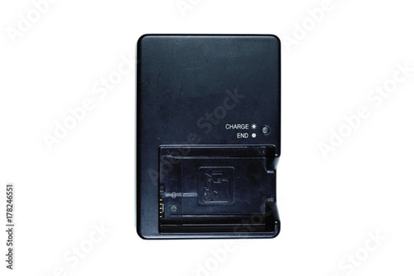 Fototapeta the black  camera's battery charger on white background isolated with clipping path