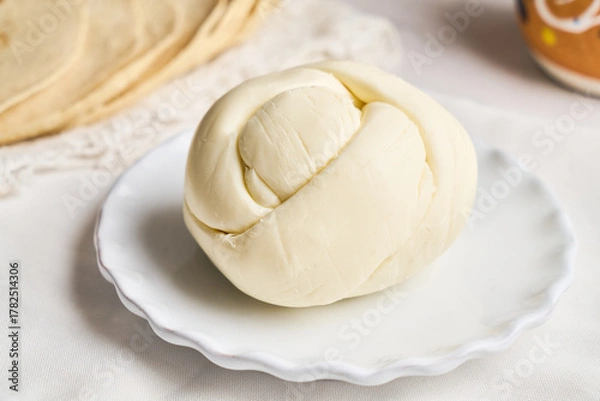 Fototapeta Oaxaca cheese ball or called quesillo, mexico.