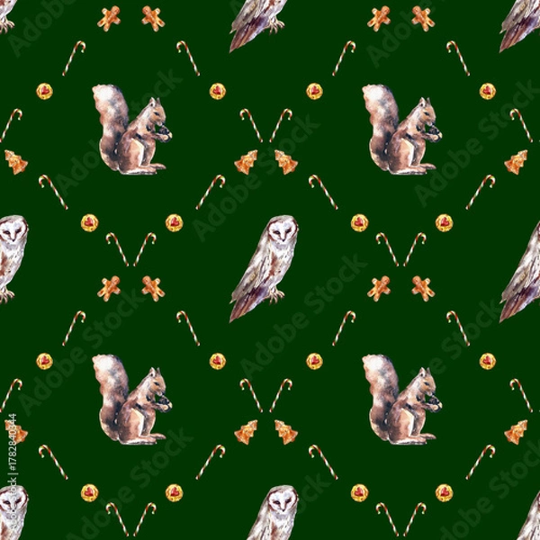 Fototapeta Watercolor Christmas seamless pattern with winter forest animals and festive treats. Features deer, fox, owl, squirrel, gingerbread cookies, dried oranges, and candy canes. 