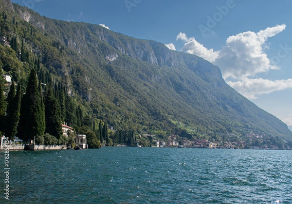 Obraz Beautiful landscape of lake Como in Varenna , Italy with green mountains, blue water and white clouds