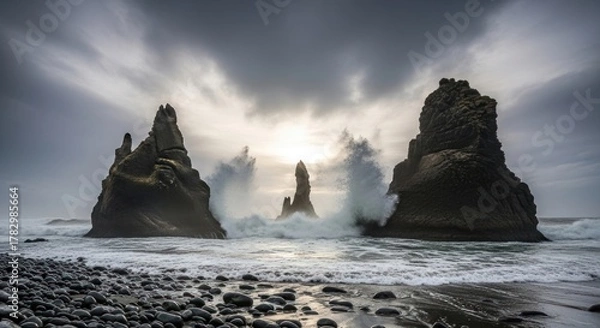 Fototapeta Dramatic Waves Crashing on Reynisdrangar Sea Stacks at Reynisfjara Black Sand Beach in Iceland under a Stormy Sky, Highlighting the Raw Power of Nature