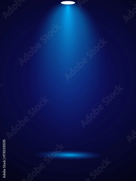 Fototapeta Dramatic Blue Spotlight Illuminating an Empty Stage

