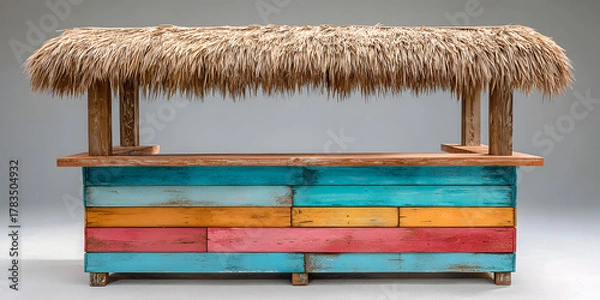 Fototapeta Colorful 4x4 timber outdoor bar with a thatched roof, viewed directly from the front.