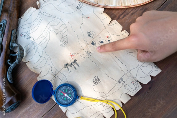 Fototapeta Pirate map for the quest.A treasure hunting game with a child.