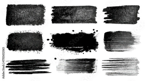 Obraz A series of textured black brush strokes arranged in a grid pattern, showcasing different styles and thicknesses.