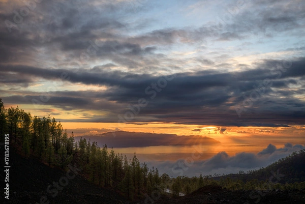 Obraz Dramatic Sunset with Sun Rays Over Pine Forest and Cloud Sea, Tenerife, Canary Islands