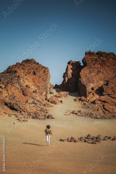 Fototapeta Dramatic Red Volcanic Rock Formation in Arid Desert Landscape, Tenerife, Canary Islands