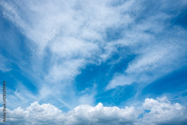 Obraz blue sky and white clouds.