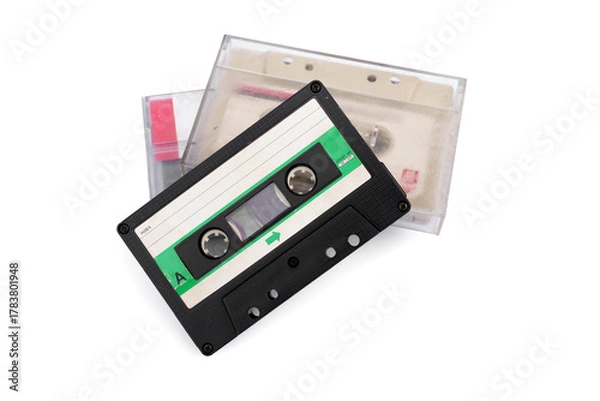 Fototapeta Old transparent compact vintage audio. Cassette tapes stacked isolated on white background.