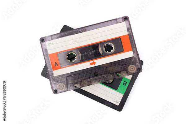 Fototapeta Old transparent compact vintage audio. Cassette tapes stacked isolated on white background.