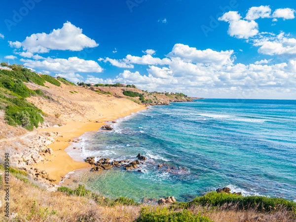Obraz Golden sandy beach of Le Cannella Capo Rizzuto Calabria Italy with turquoise waters rocky shoreline and vivid sky symbolizing freedom nature serenity and Mediterranean summer allure.