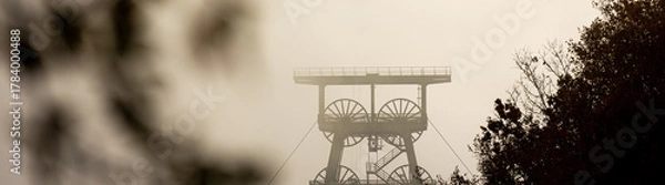 Obraz a mining tower in the morning light panorama