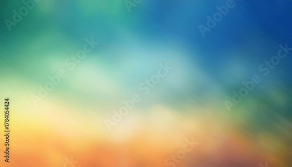 Fototapeta A Blurred Ombre Background In Shades Of Blue Green Yellow And Orange