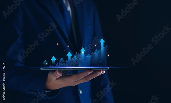Fototapeta Business growth concept, businessman show growing market chart, economy trend, finance and investment, business strategy and planning