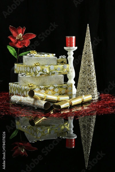 Obraz Decorative Christmas presents on black reflective surface
