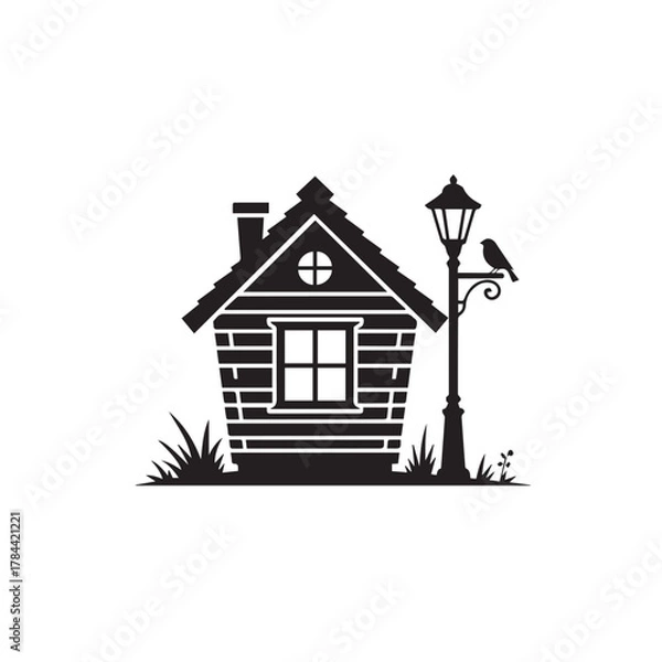 Fototapeta Silhouette of a small house with a lamp post and bird