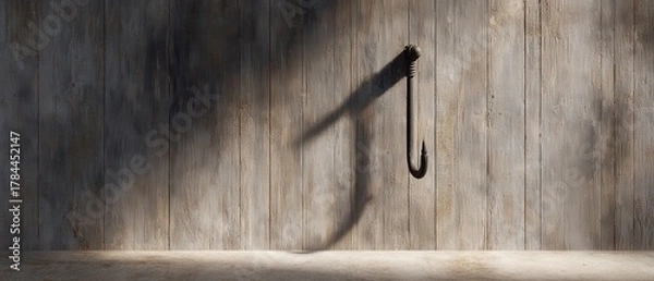 Fototapeta Rustic Wooden Wall with Shadow of a Hook in Soft Light, Ideal for Vintage and Industrial Themes