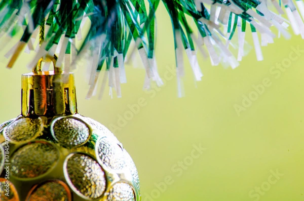 Obraz Close up of golden Christmas balls with customizable space for text or wishes.