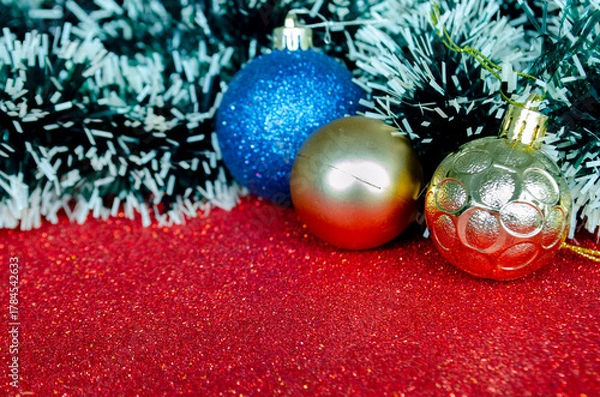 Obraz Golden Christmas ball with customizable space for text or wishes. Christian celebration concept.